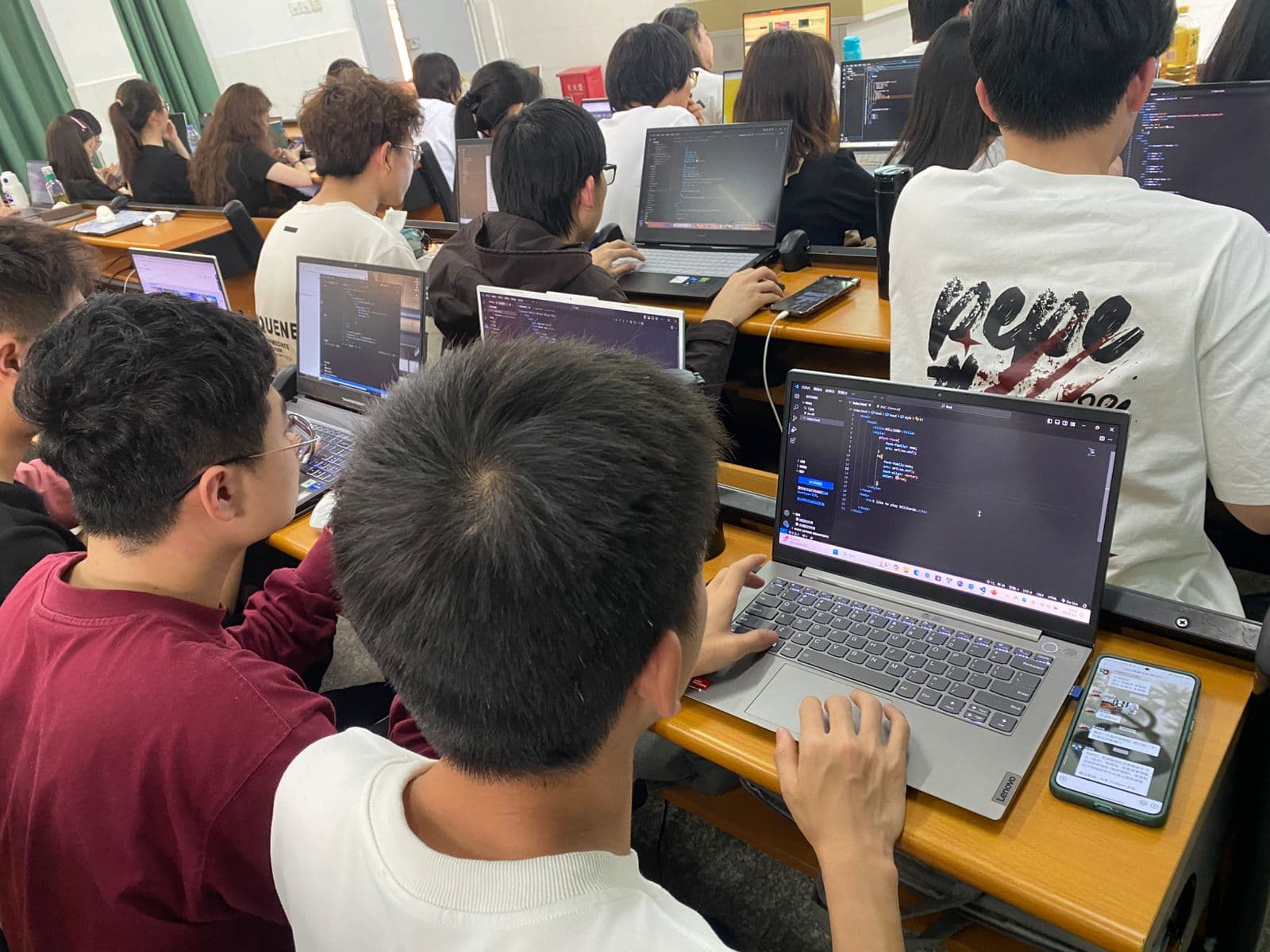 Students learning web development and coding at Yango University in Fuzhou, China