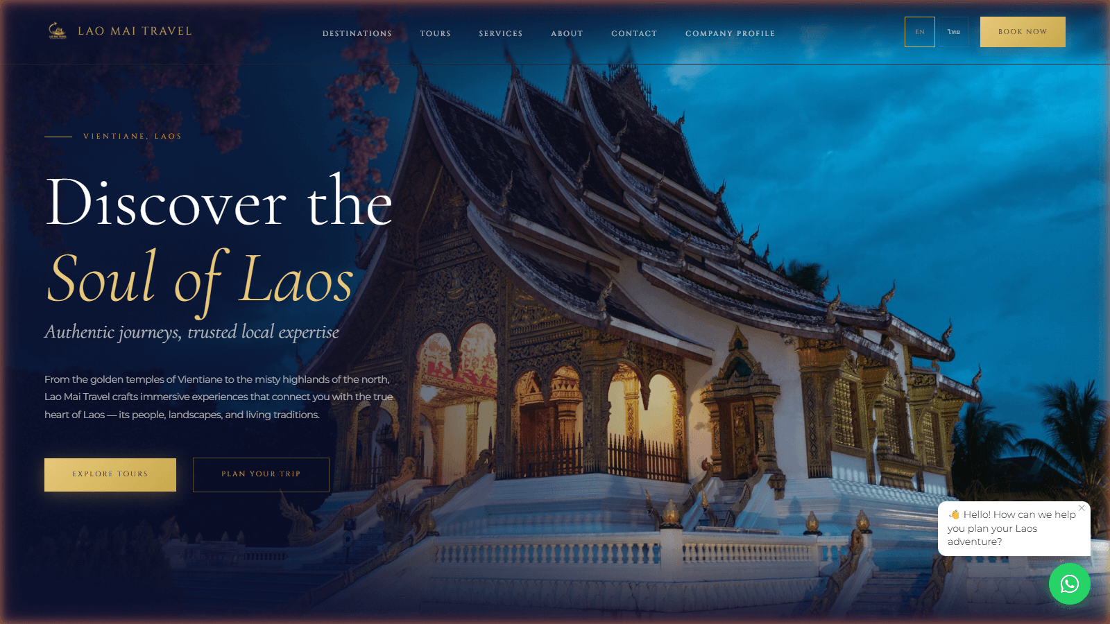 Lao Mai Travel hero section — temple at dusk with navy and gold design